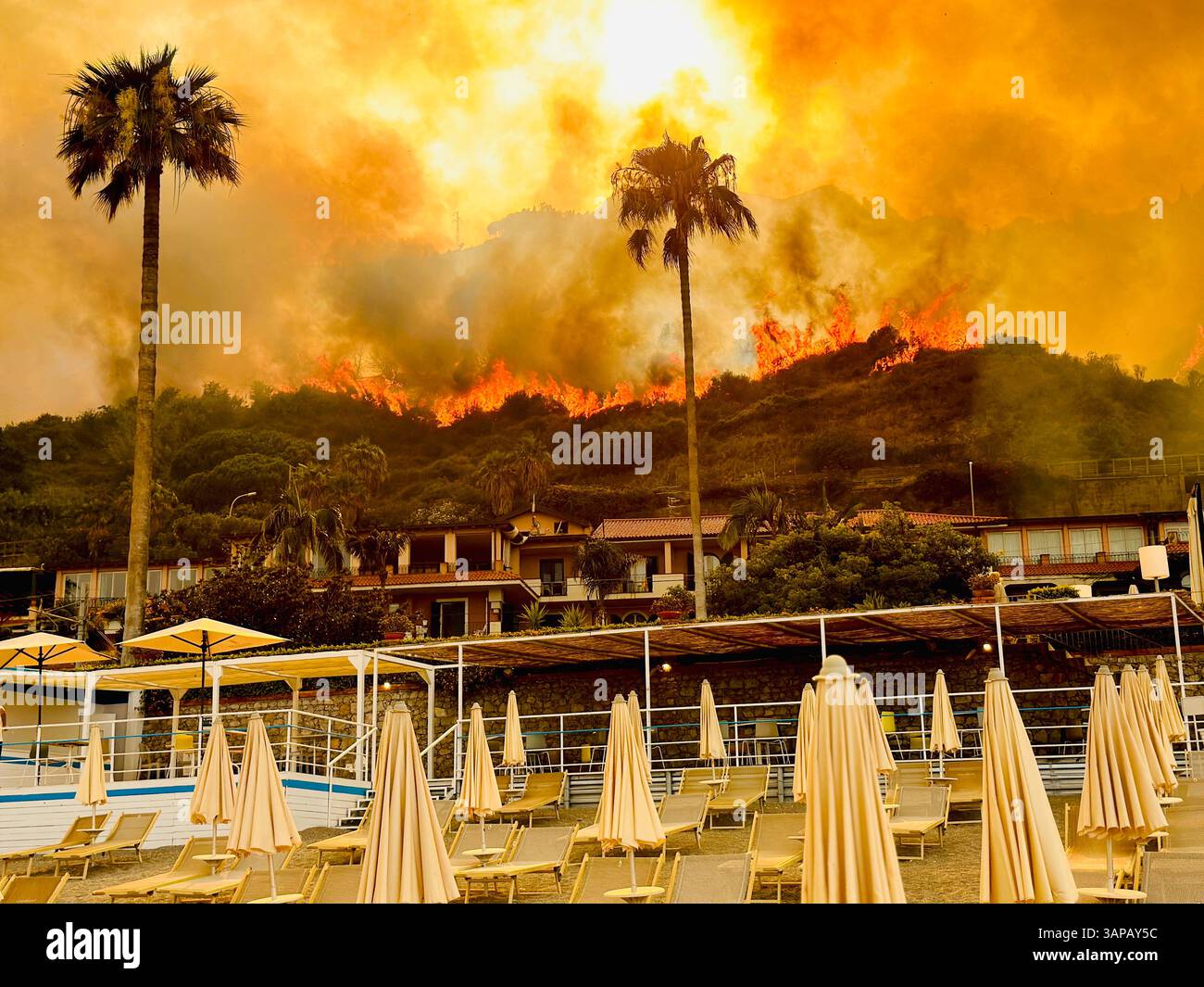 Beachfront Resort Threatened By Raging Wildfire Stock Photo Alamy