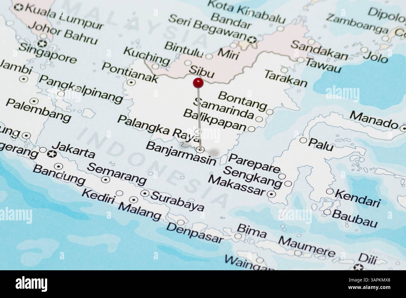 Macro Photo Of A Red Pin Needle Into Banjarmasin City Of Indonesia Macro Photo Of A Red Pin Needle Into Banjarmasin City Of Indonesia Political Map 3APKMX8 