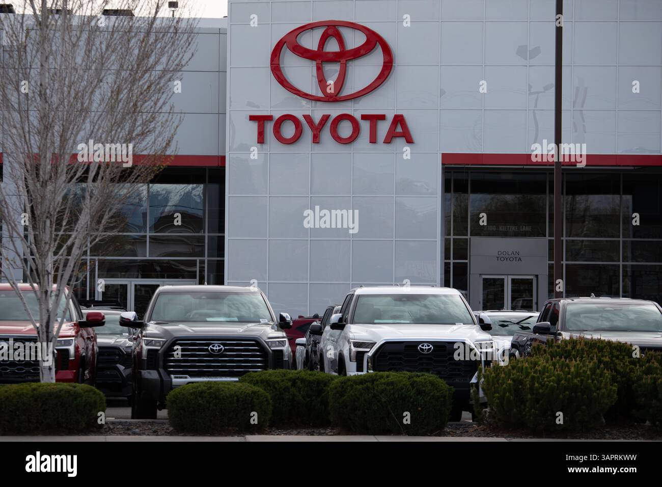 Toyota dealership displays vehicles for sale outside of the showroom ...