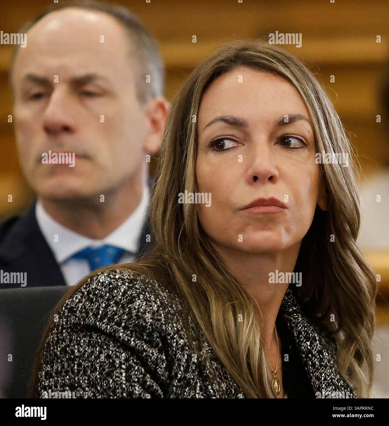 Karen Rad listens to prosecutor Hank Brennan during her second trial ...