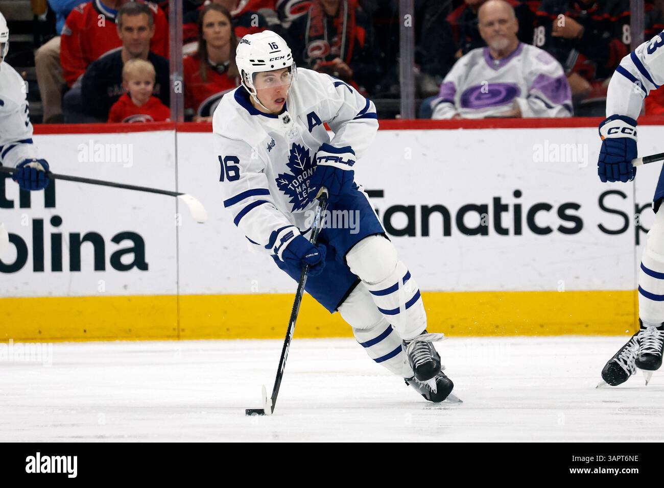 Toronto Maple Leafs' Mitch Marner (16) skates with the puck against the ...