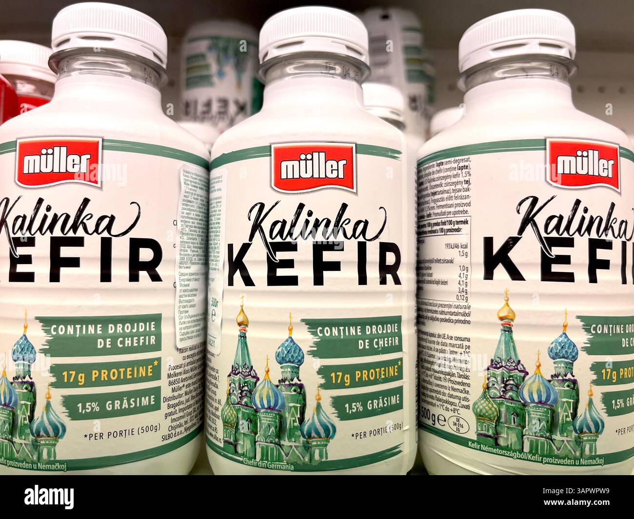 Kalinka kefir drink by Müller on a supermarket shelf as traditional fermented dairy product in branded plastic bottles, product of Germany - Smartphone Captured Stock Image