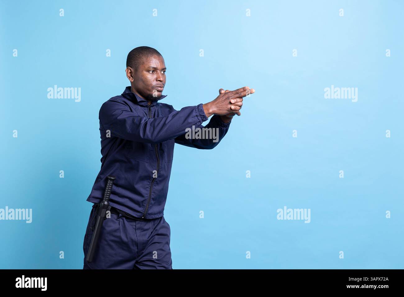 African american security guard mimics pointing an imaginary gun ...