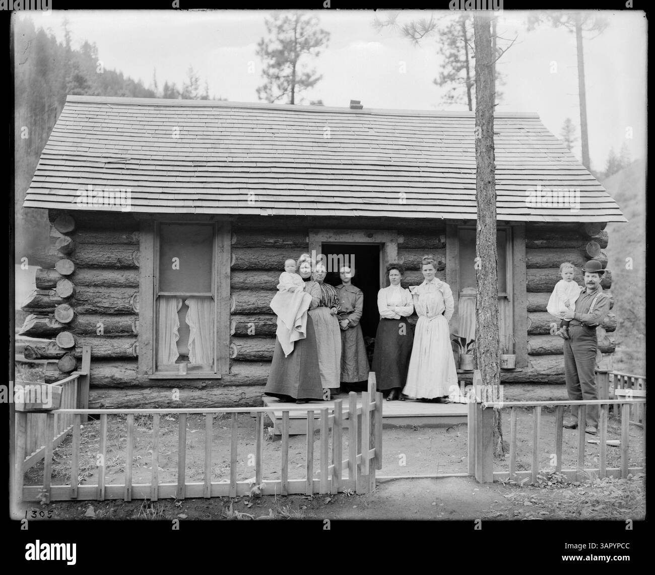 man-standing-front-log-cabin-black-and-white-stock-photos-images-alamy