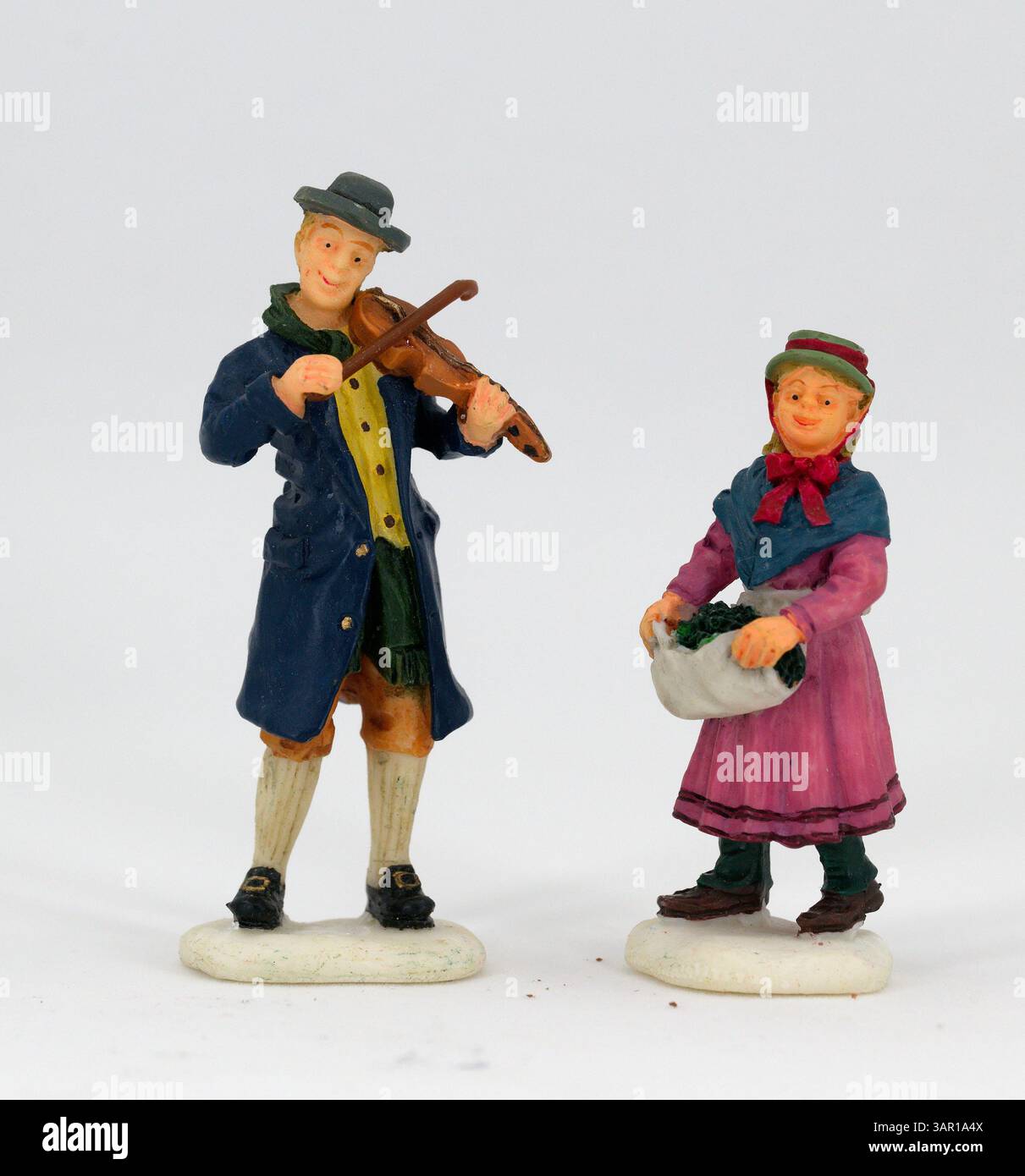Christmas old style figure fiddler decorations on a white background Stock Photo