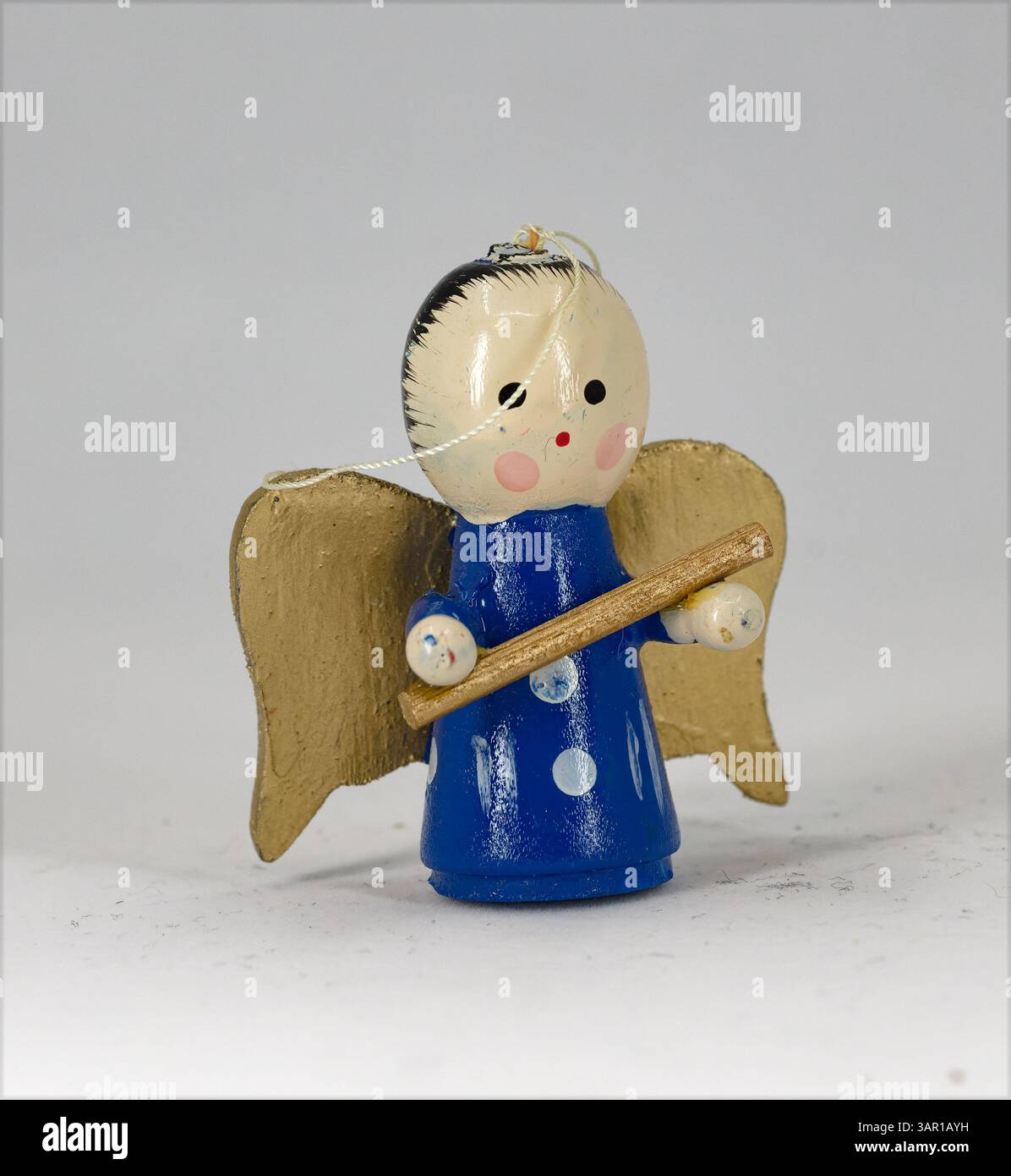 Wooden Christmas Angel decoration on a plain white background Stock Photo