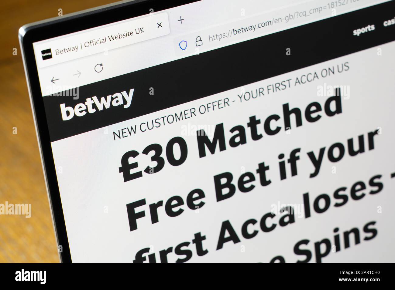 gambling website & logo on a laptop screen, UK. Concept: betting, problem gambling, gambling commission, gambling addiction Stock Photo