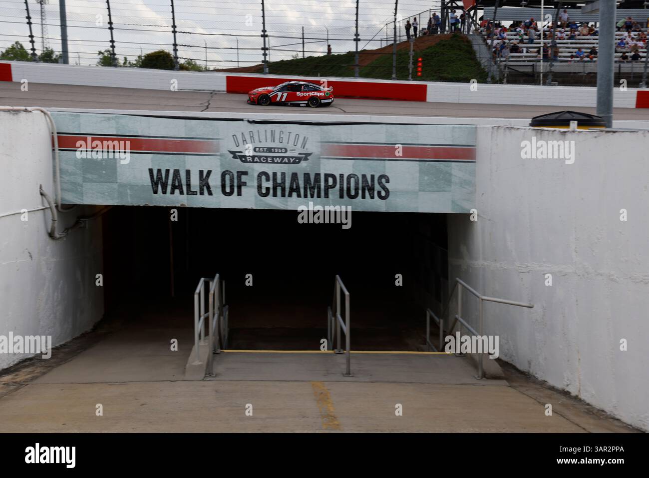 DENNY HAMLIN (11) of Chesterfield, VA races for the Goodyear 400 in ...