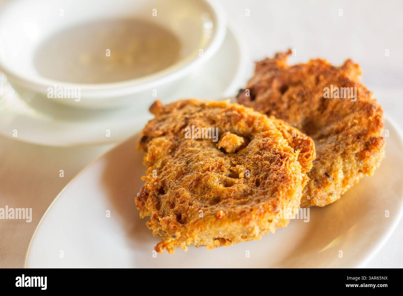 Tortang tabios or tortang sinarapan is a Bicolano specialty dish made from the world’s smallest fish found in the Philippines called sinarapan Stock Photo
