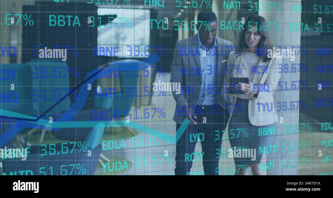 Image of finance data processing over two diverse colleagues using tablet talking in corridor Stock Photo