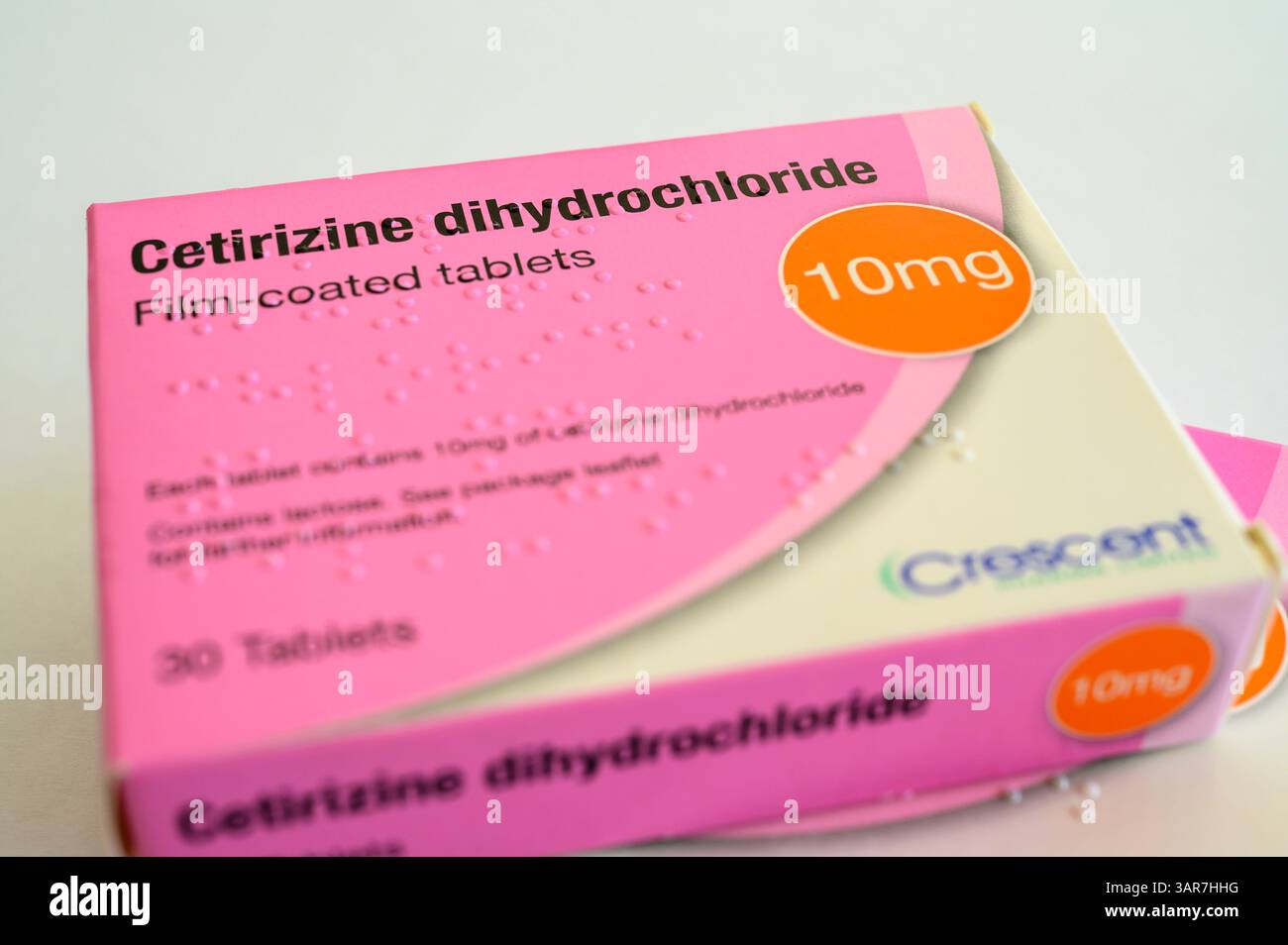 Packets of Cetirizine dihydrochloride antihistamine tablets for allergy ...