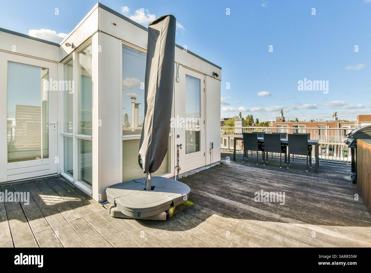 Image showcasing A stylish rooftop terrace featuring modern furniture, a sleek design ...