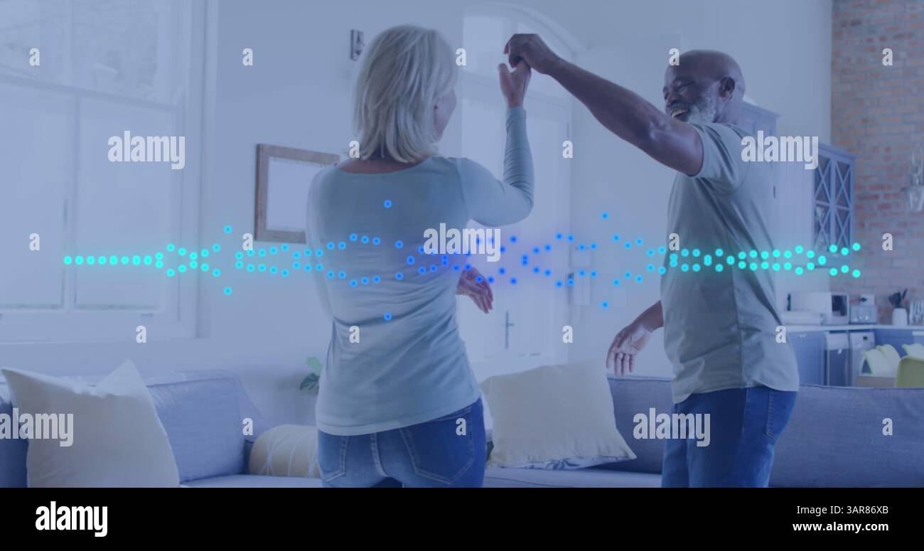 Image of happy diverse couple dancing over light spots moving Stock Photo