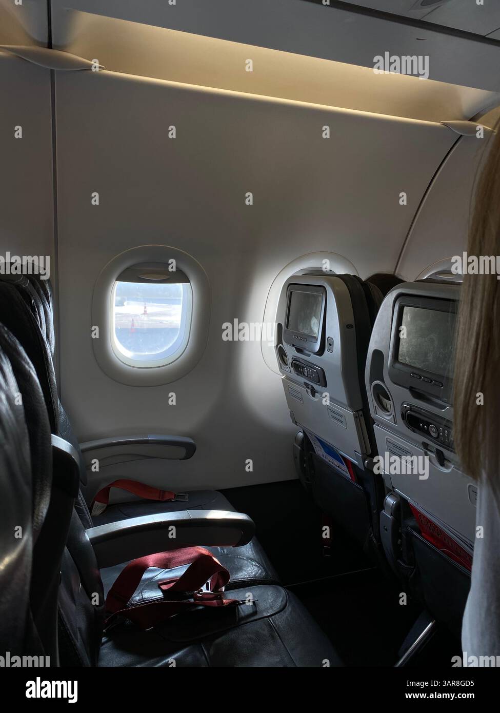 Airplane seats with a window view - Smartphone Captured Stock Image