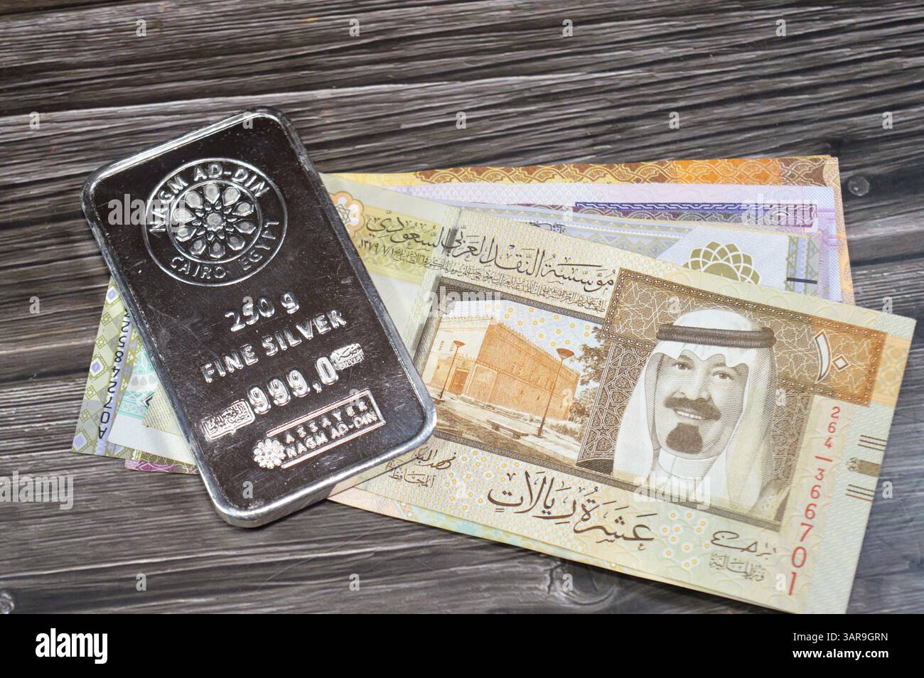 Cairo, Egypt, February 21 2025: Saudi riyals money banknotes and Nagm ...