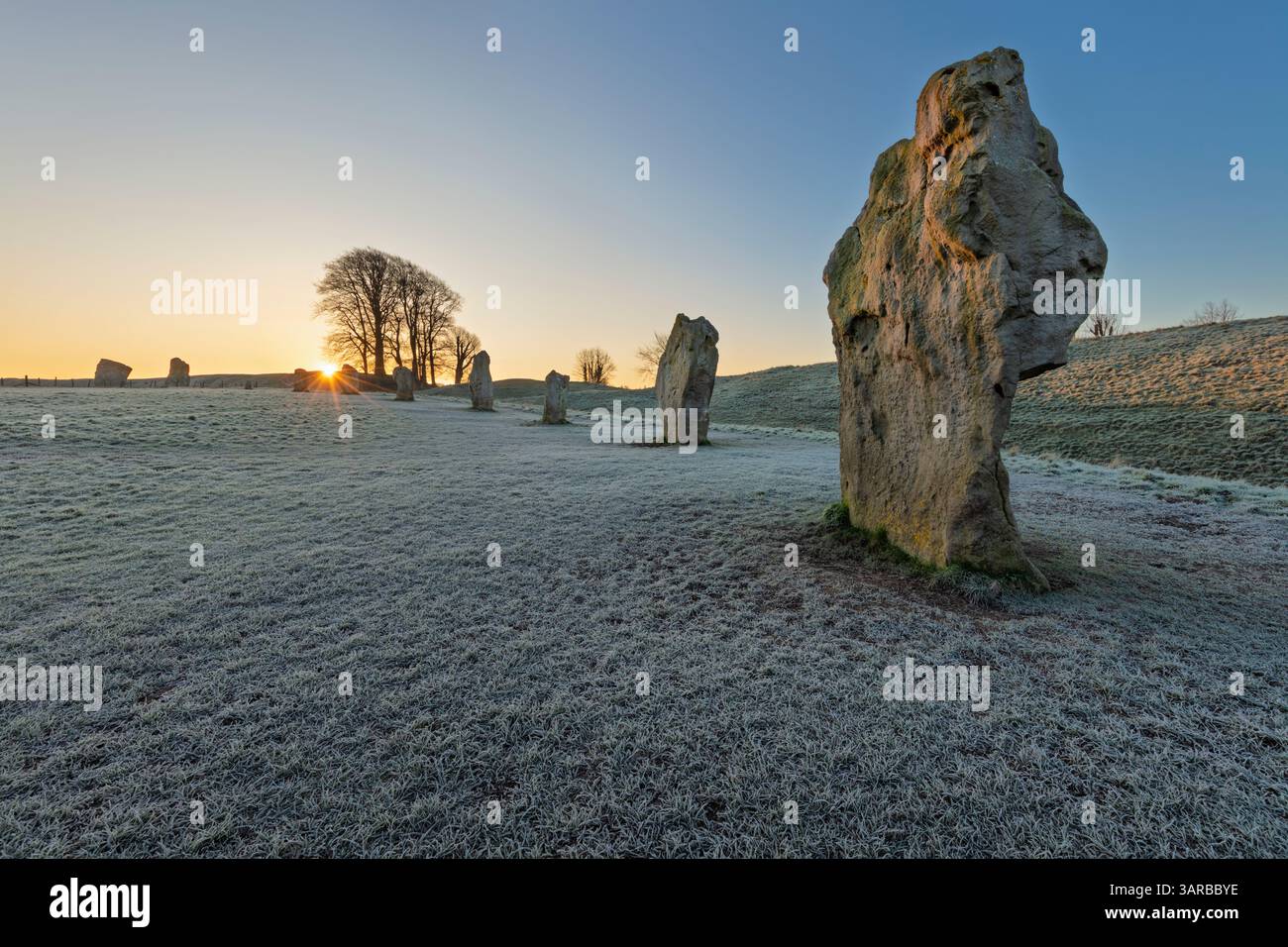 Standing stones of Avebury at sunrise on frosty winter morning, Avebury, Wiltshire, England, United Kingdom, Europe Stock Photo