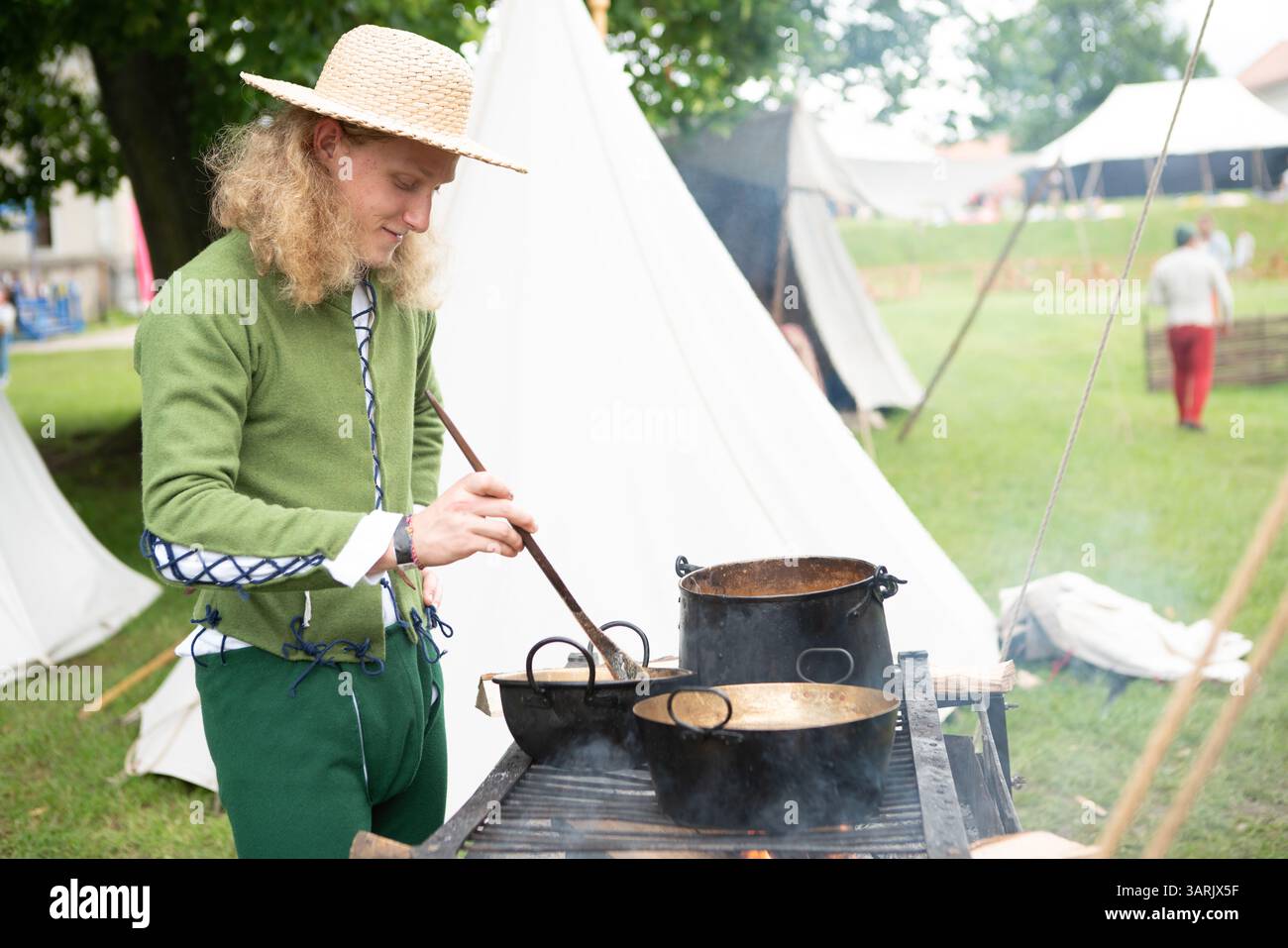 Chef in traditional attire crafts hi-res stock photography and images ...