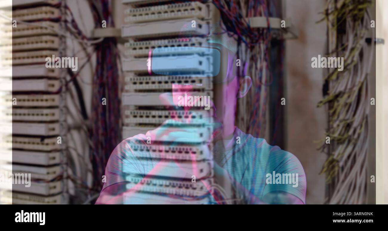 Image of men using vr headset over server room Stock Photo