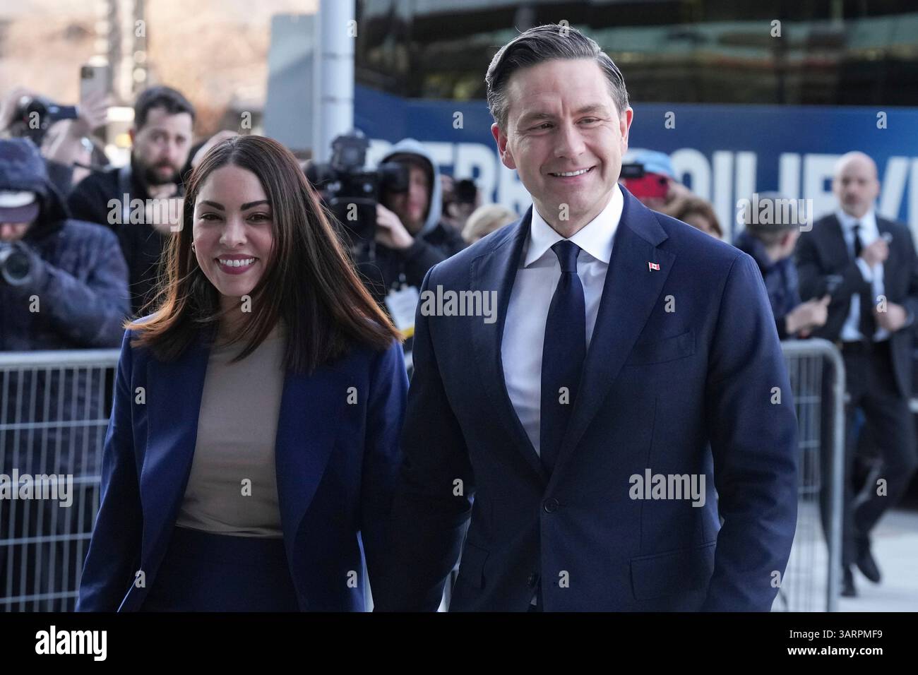 Conservative Leader Pierre Poilievre arrives with his wife Anaida