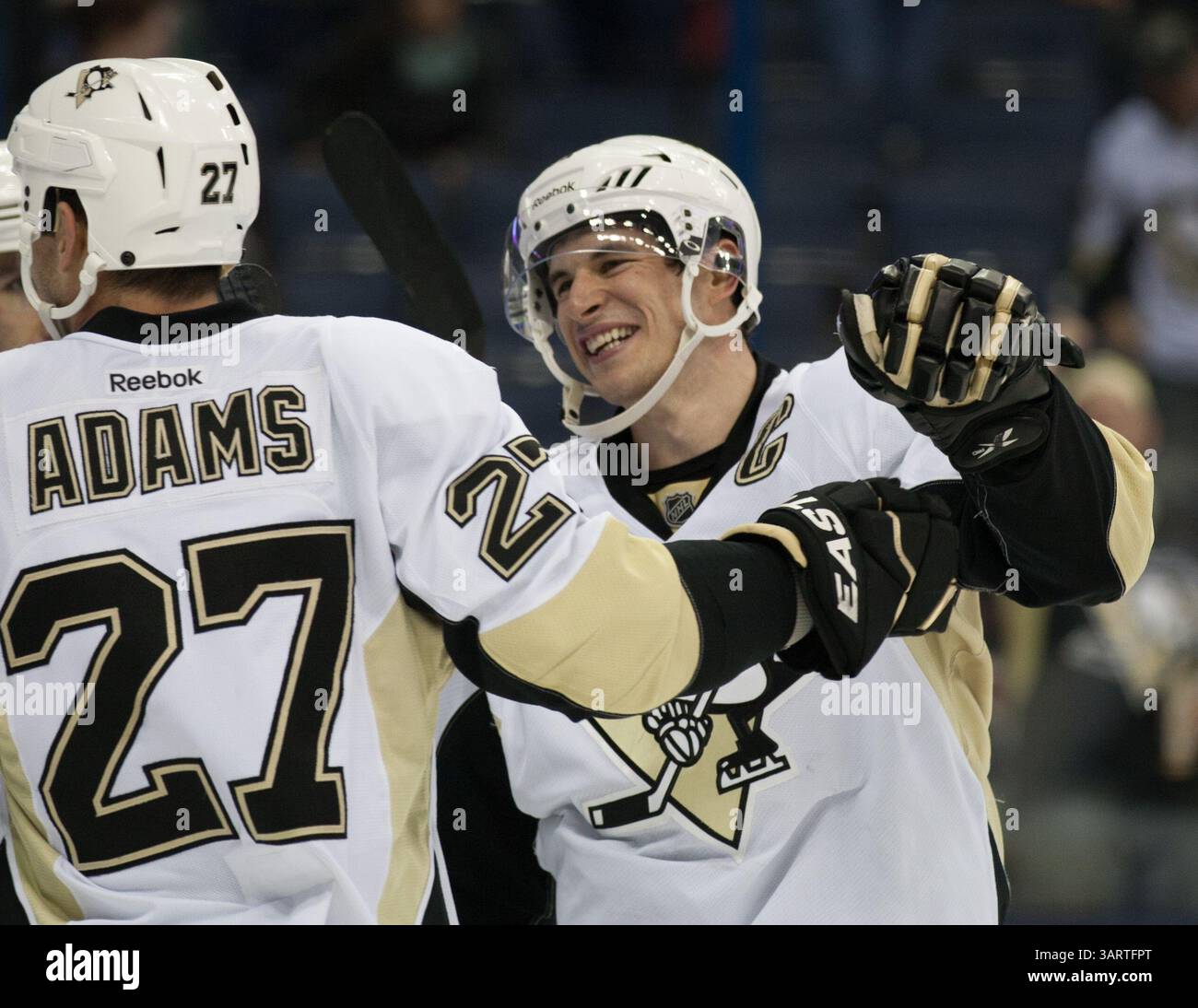 Pittsburgh Penguins' Sidney Crosby, right, and New York