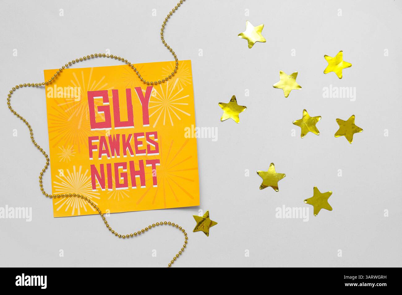 Greeting card for Guy Fawkes night with beads and confetti on grey ...
