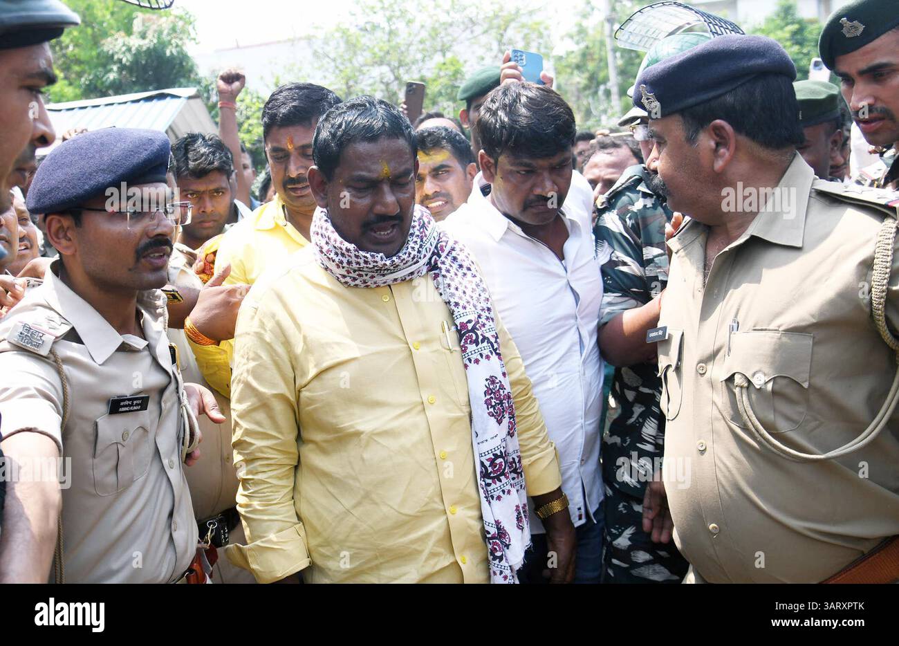Patna, India. 17th Apr, 2025. PATNA, INDIA - APRIL 17: Security personnel escort Rashtriya Janata Dal (RJD) MLA Ritlal Yadav who surrendered before the Danapur Court in connection with an extortion case on April 17, 2025 in Patna, India. (Photo by Santosh Kumar/Hindustan Times/Sipa USA) Credit: Sipa USA/Alamy Live News Stock Photo