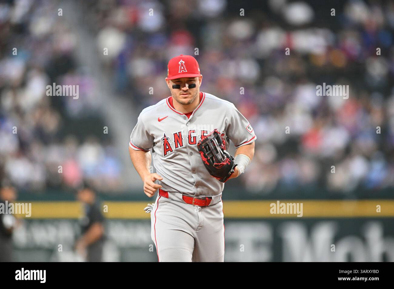 Los Angeles Angels outfielder Mike Trout runs off the field during a ...