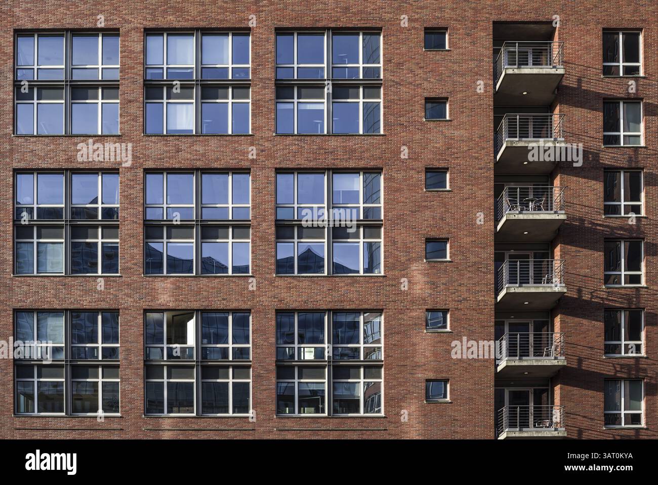 House facade in hamburg's Speicherstadt - reflection in the windows of ...
