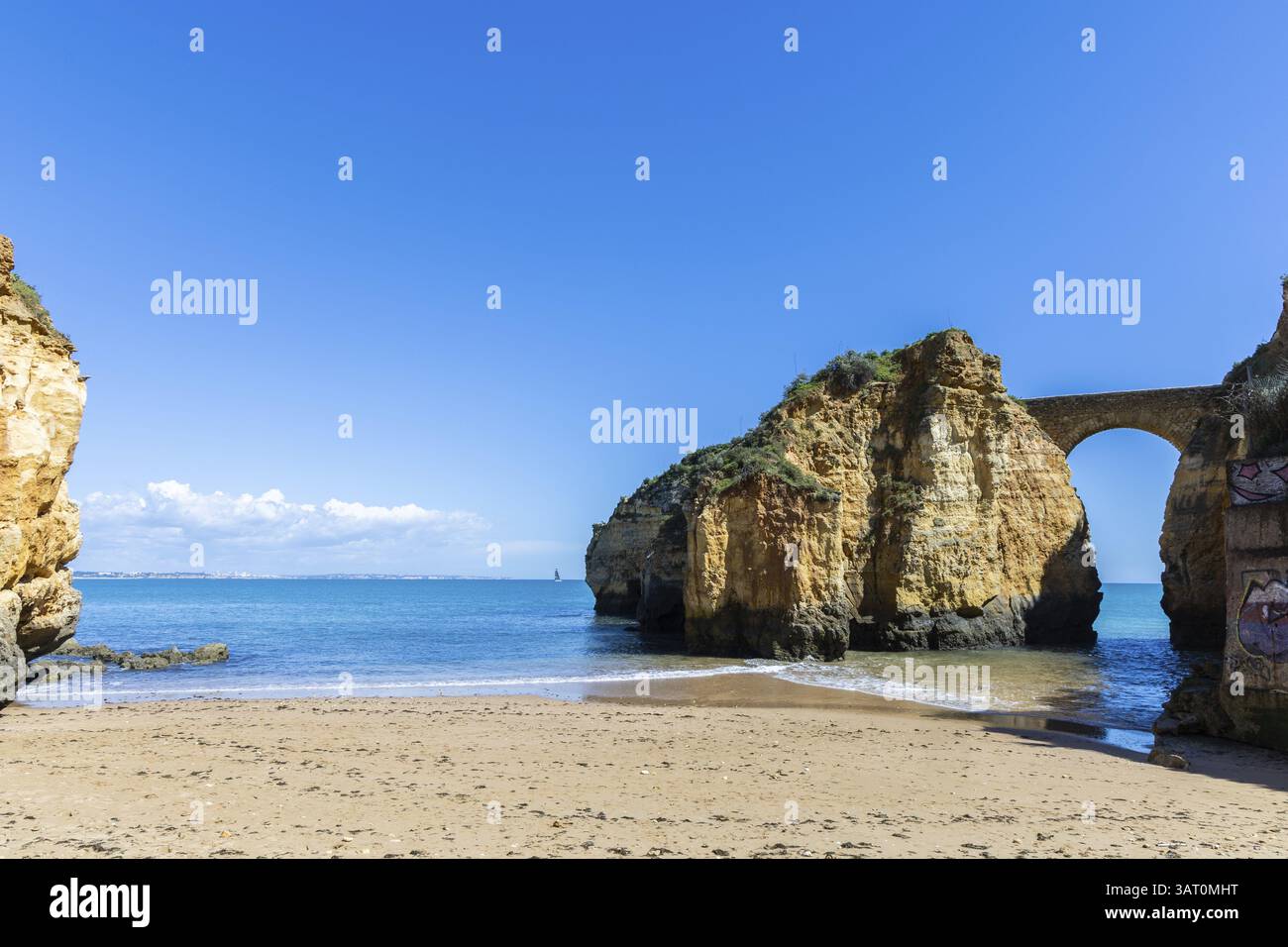 Yellow Rocks Cliffs Yellow rocks and cliffs on a sandy beach. A bay by the sea, over which ...