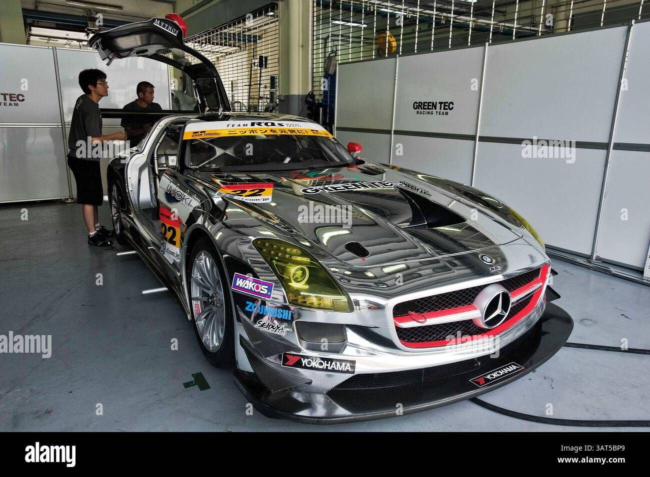 Sls Racing Game A Mercedes SLS of Greentec Racing sits ready to prepped in their pit ...