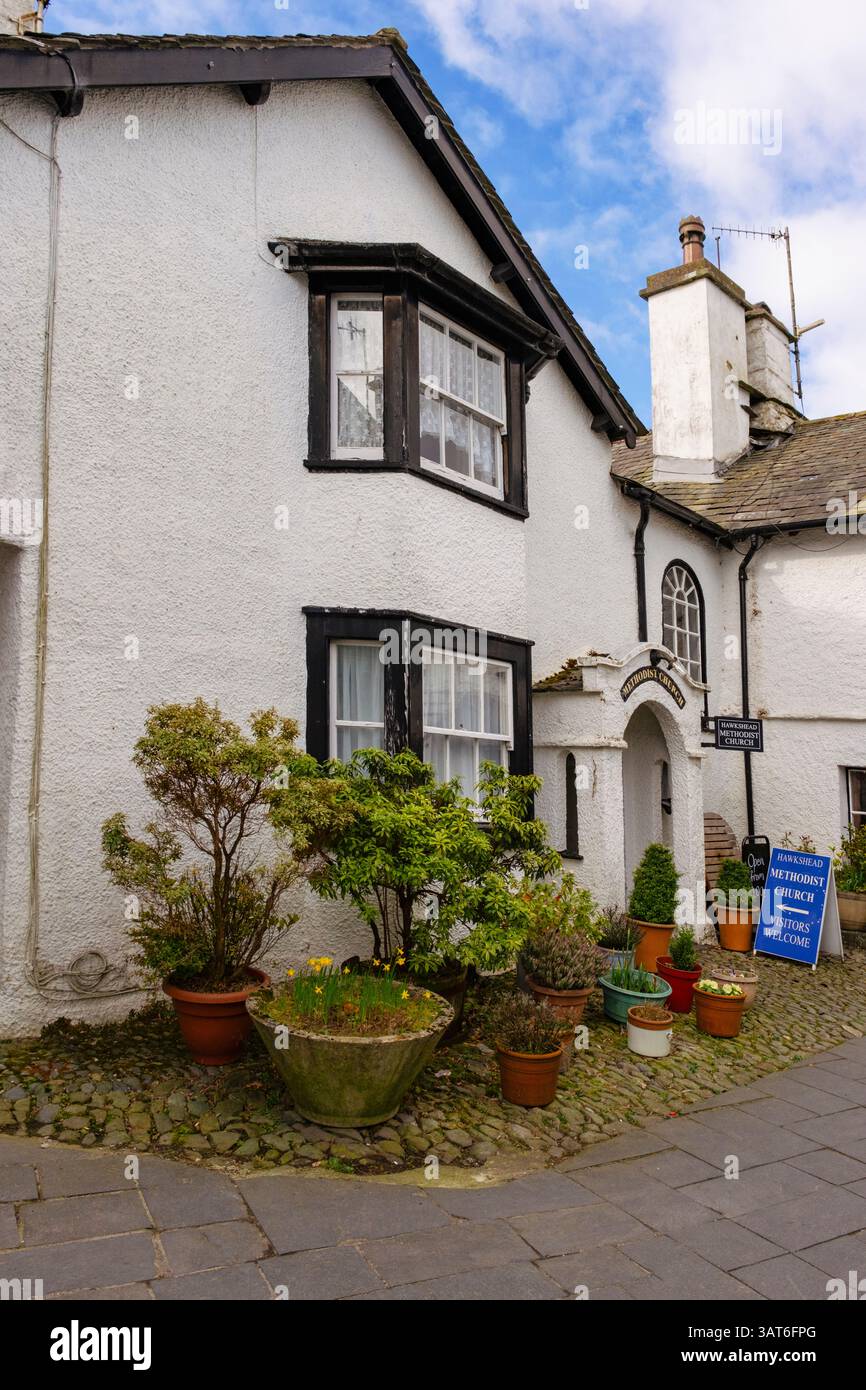 Methodist church in a 15th century cottage in Lake District village. It is oldest building used for Methodist worship in the world. Hawkshead, Cumbria Stock Photo