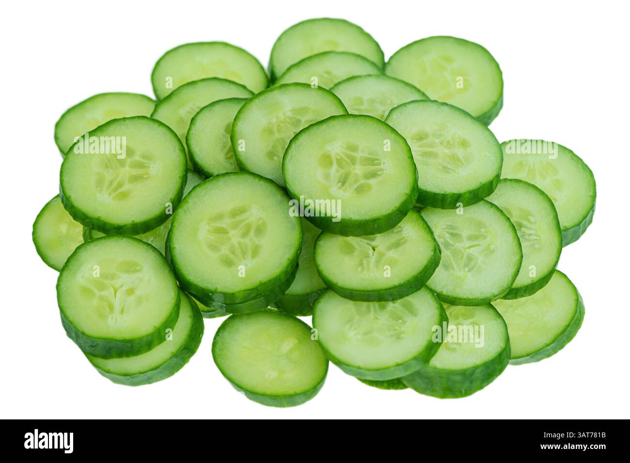 Thinly sliced cucumbers isolated on a white background Stock Photo