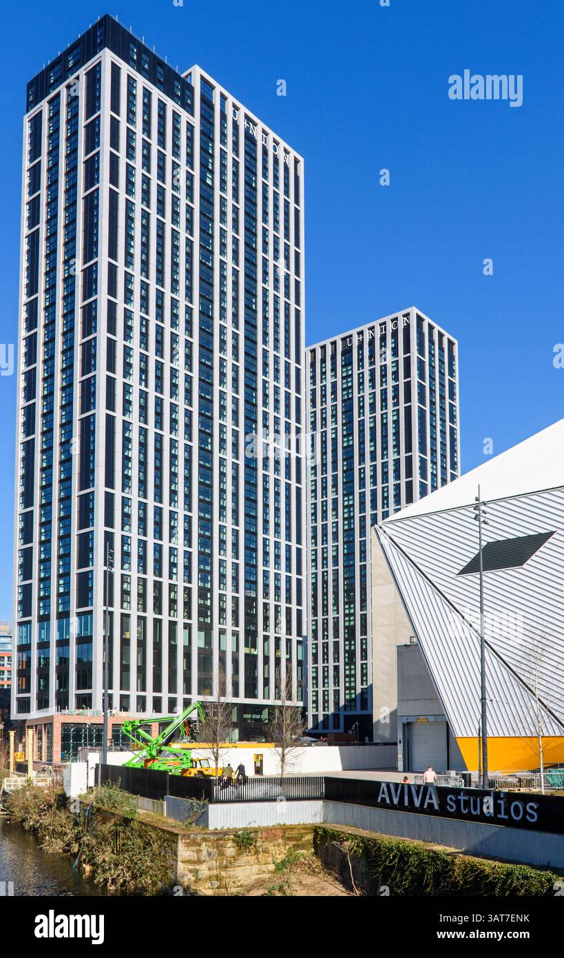The U+nion (Union) apartment block under construction next to the Aviva Studios arts centre, Manchester, UK.  Architects: Denton Corker Marshall. Stock Photo