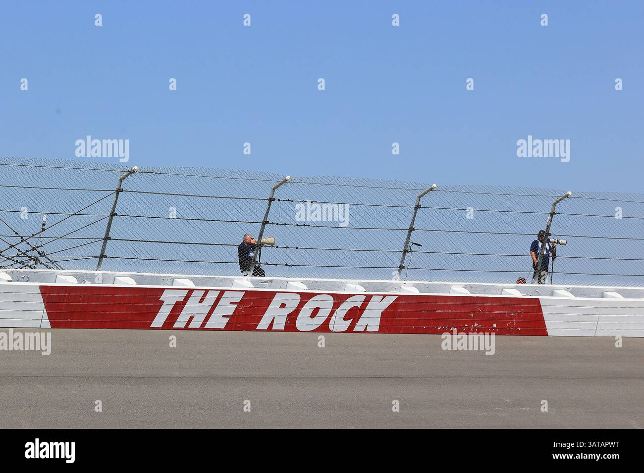 ROCKINGHAM, NC - APRIL 18: The Rock logo on the Turn 1 wall during ...
