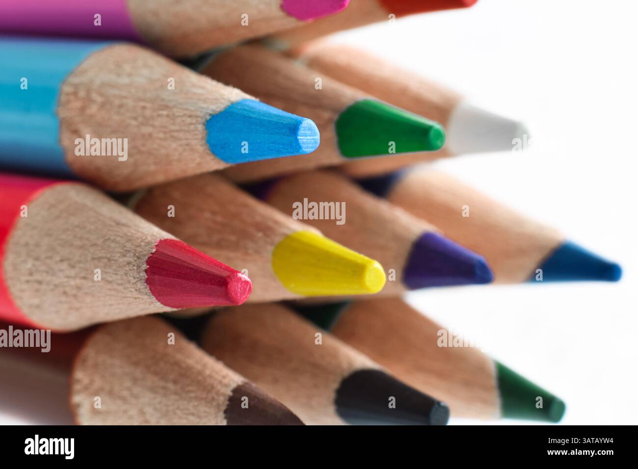 Sharpened colorful pencils macro closeup isolated on white Stock Photo