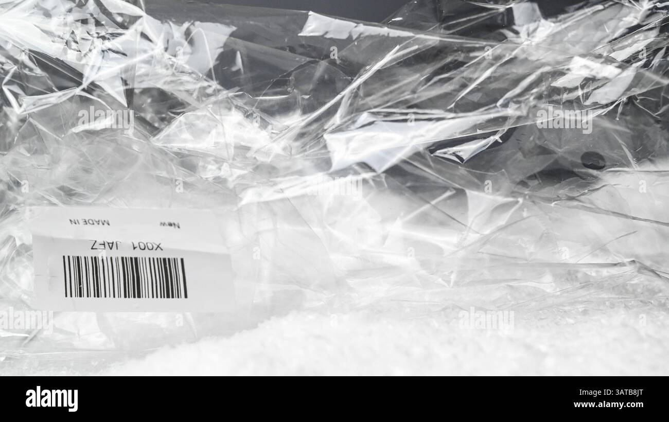 Transparent plasic foil surface background for packaging slides. Stock Photo