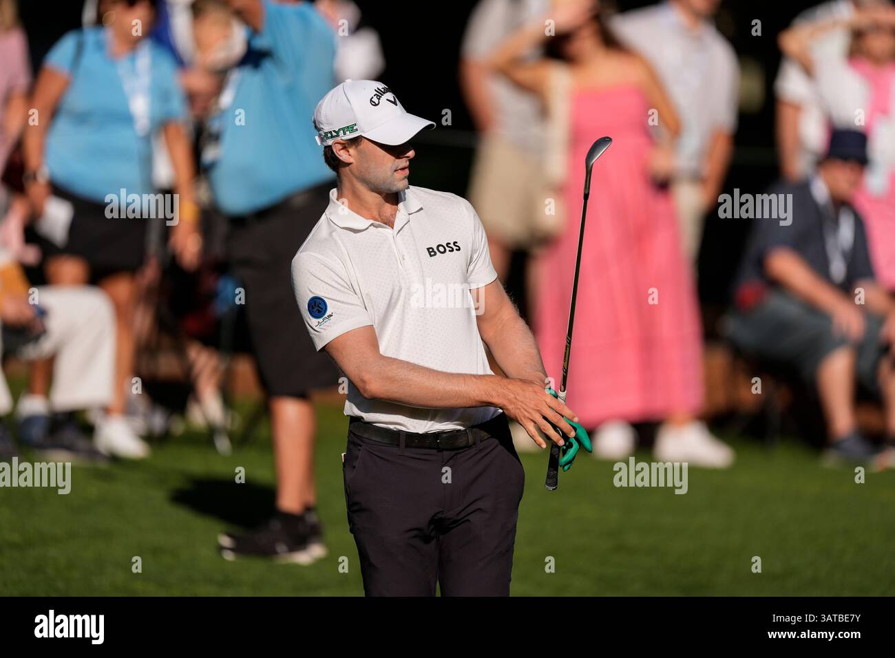 Thomas Detry, of Belgium, watches his ball on the first green during ...