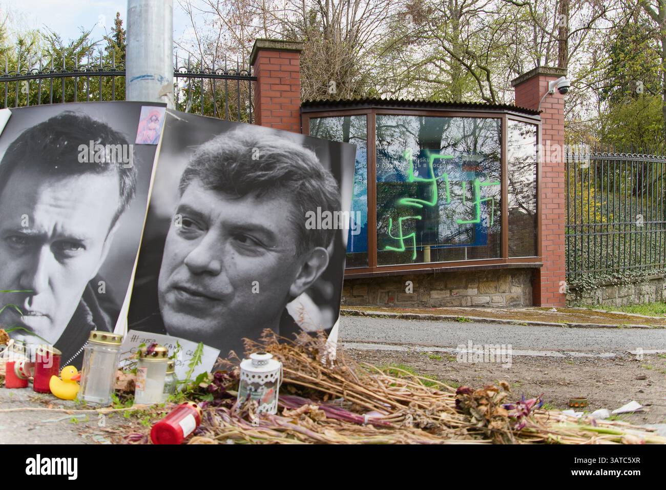 Spray-painted fascist swastikas on the window of the Embassy of the ...