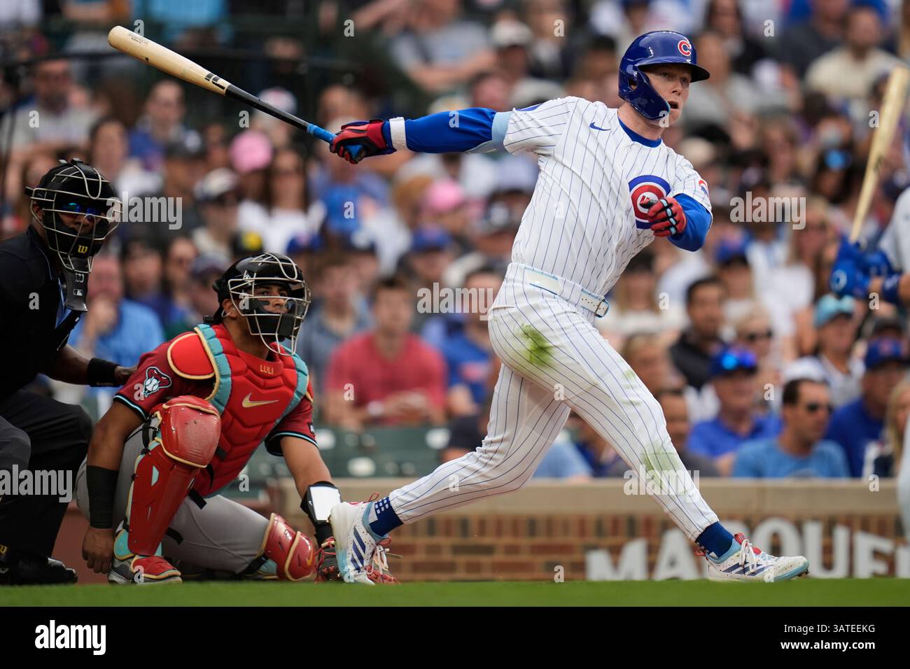 Chicago Cubs' Pete Crow Armstrong (4) hits a double during the second