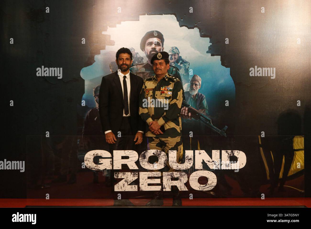 Indian Bollywood actor Farhan Akhtar (left) poses for a picture with an ...