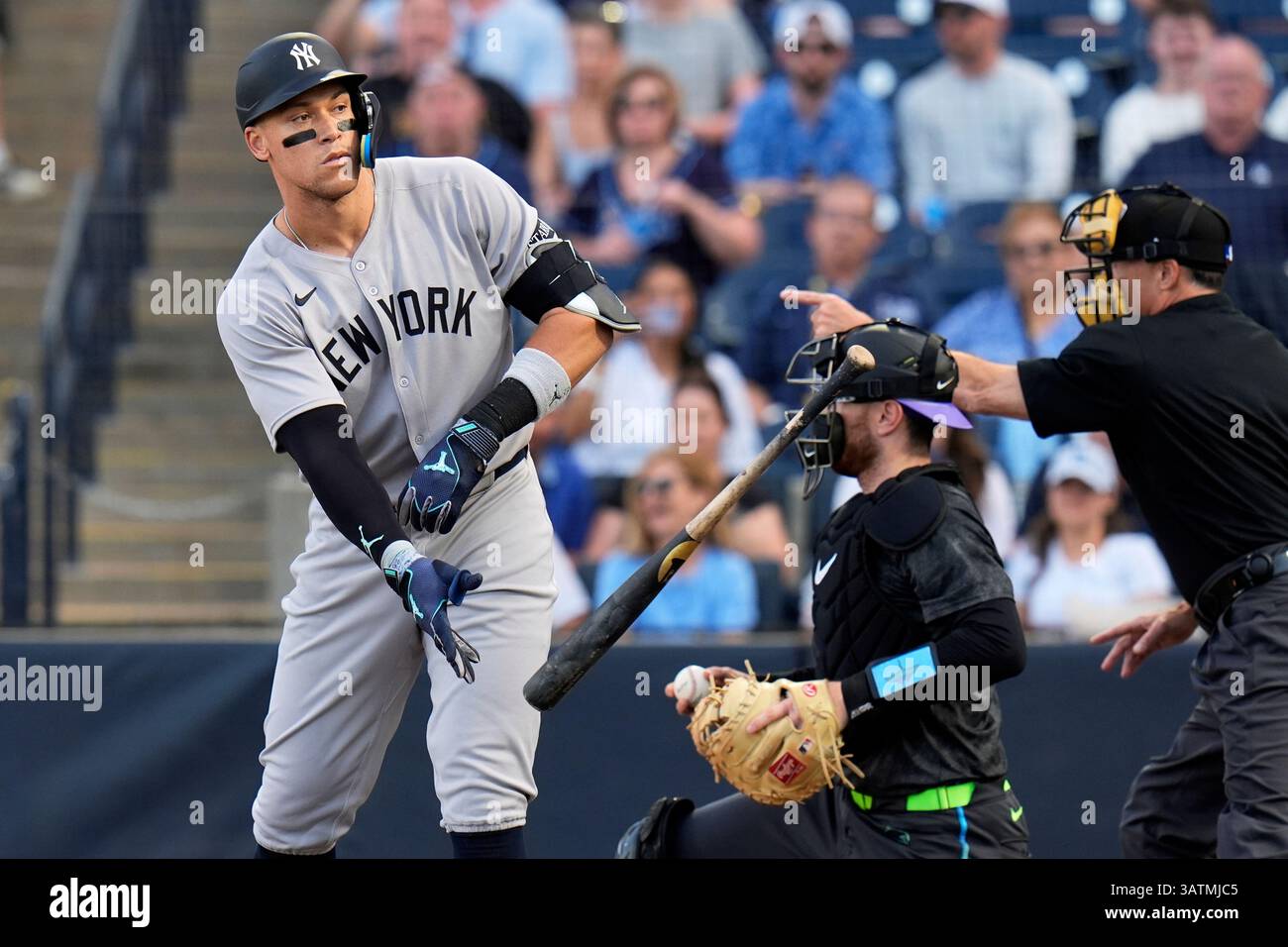 York Rasmussen New York Yankees' Aaron Judge, left, flips his bat as he draws a walk ...
