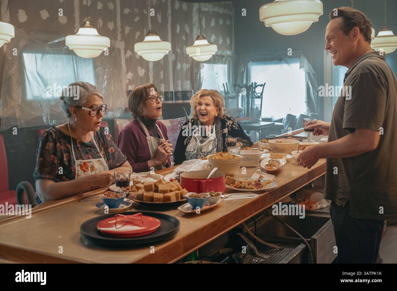 RELEASE DATE: May 9, 2025. TITLE: Nonnas. STUDIO: Netflix. DIRECTOR: Stephen Chbosky. PLOT: After losing his beloved mother, a man risks everything to honor her by opening an Italian restaurant with actual grandmothers as the chefs. STARRING: (L-R) LORRAINE BRACCO as Roberta, TALIA SHIRE as Teresa, BRENDA VACCARO as Antonella, VINCE VAUGHN as Joe Scaravella. (Credit Image: © Netflix/Entertainment Pictures/ZUMAPRESS.com) EDITORIAL USAGE ONLY! Not for Commercial USAGE! Stock Photo