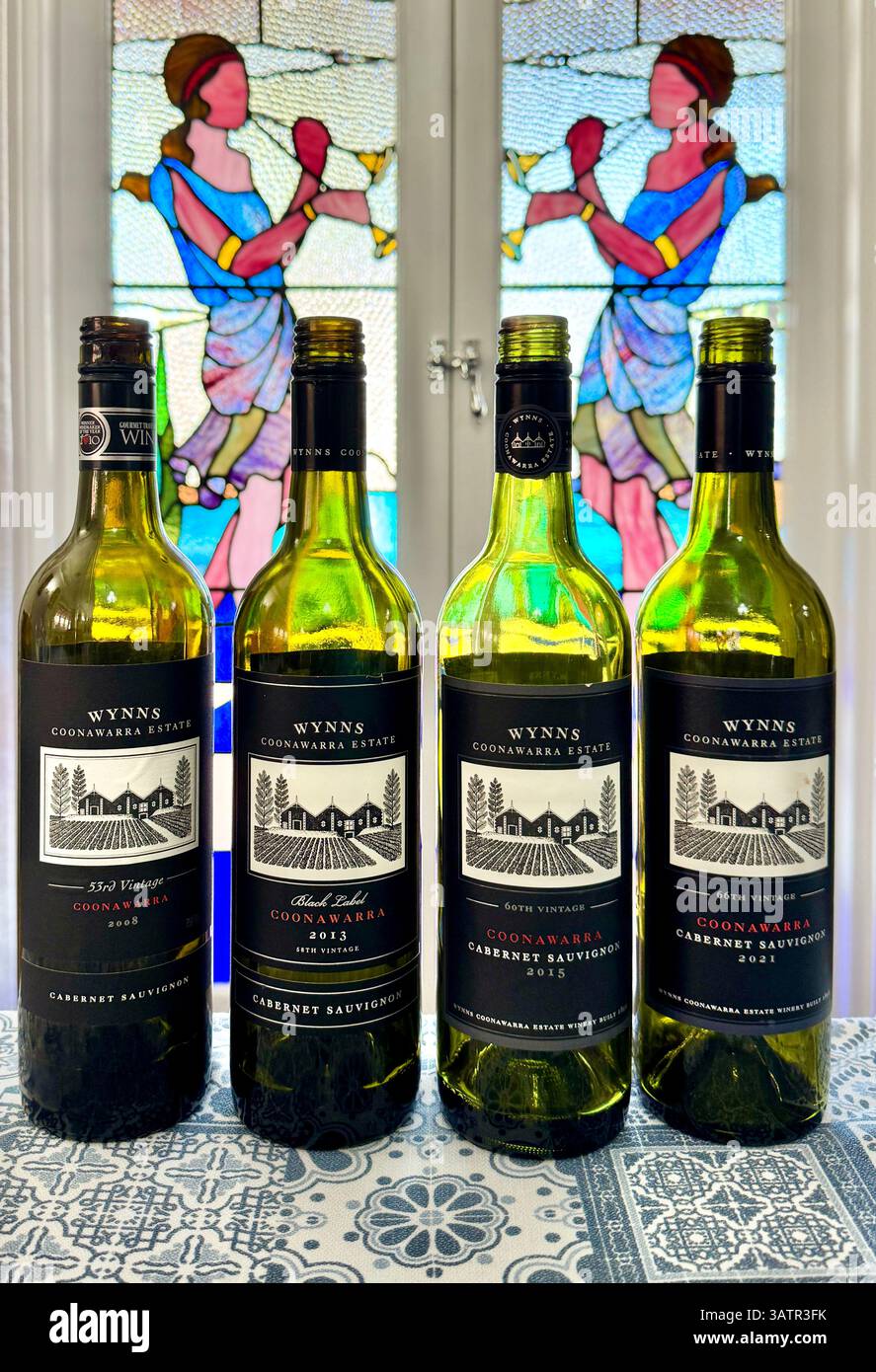 Four empty bottles of Wynns Black Label Coonawarra Cabernet Sauvignon at a vertical wine tasting of vintages 2008 2013 2015 and 2021 - Smartphone Captured Stock Image