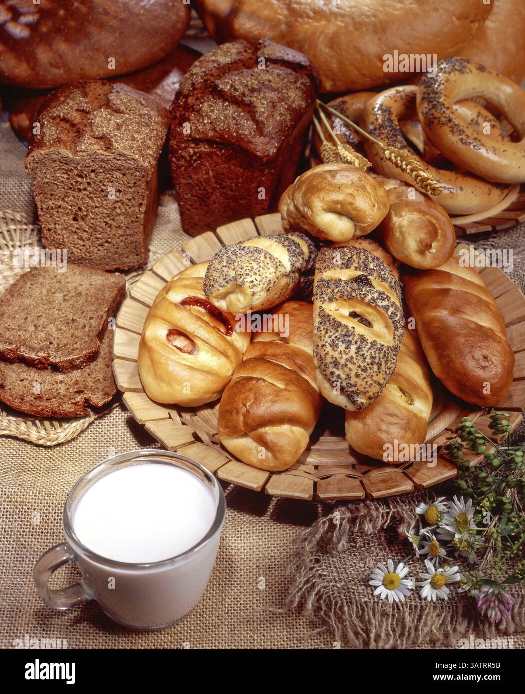 Still life with different kinds of bread and pastry on a studio
