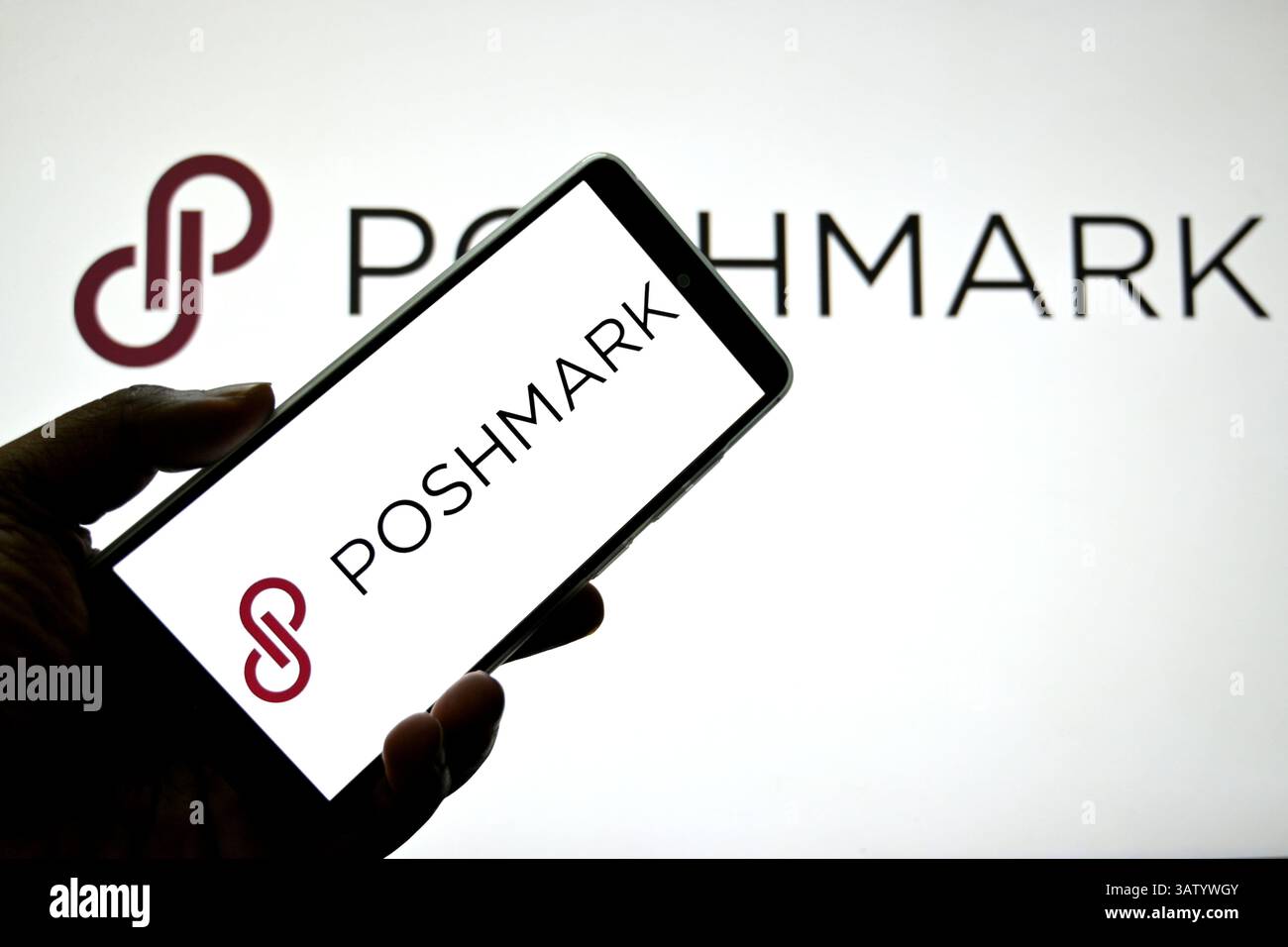 In this photo illustration, a Poshmark logo is seen displayed on a ...