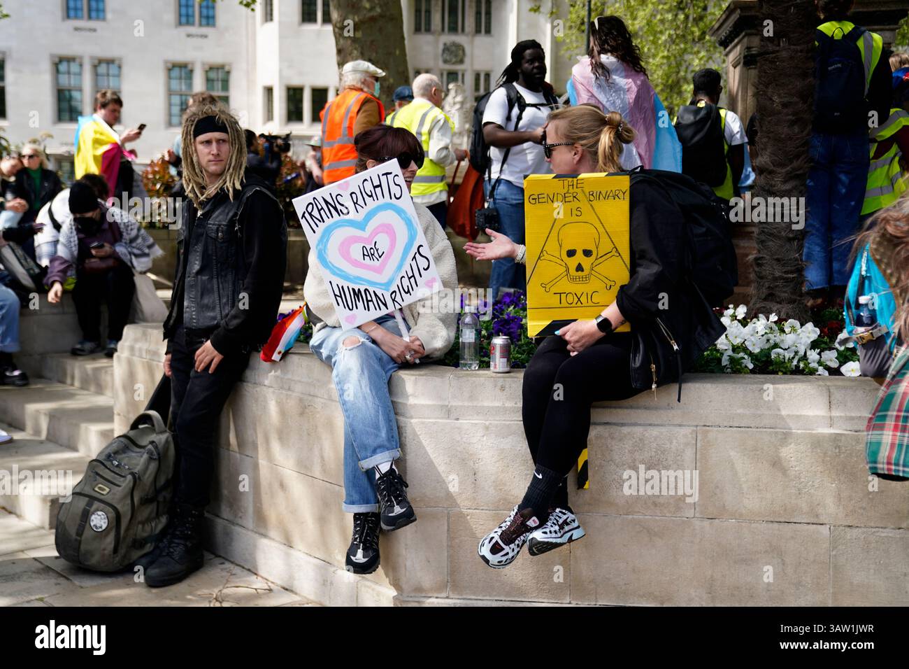 Campaigners take part in a rally organised by trans rights groups ...