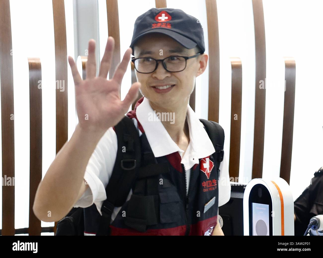 (250419) -- BEIJING, April 19, 2025 (Xinhua) -- A member of a public health team to Myanmar bids farewell to his family and friends before departing from the Beijing Capital International Airport in Beijing, capital of China, April 19, 2025. A 50-member Chinese public health team departed for Myanmar on Saturday to support post-earthquake public health efforts there.The 7.9-magnitude earthquake, which jolted Myanmar on March 28, has claimed 3,726 lives and left 5,105 people injured, with 129 others remaining unaccounted for as of April 18, according to Myanmar's State Administration Council In Stock Photo