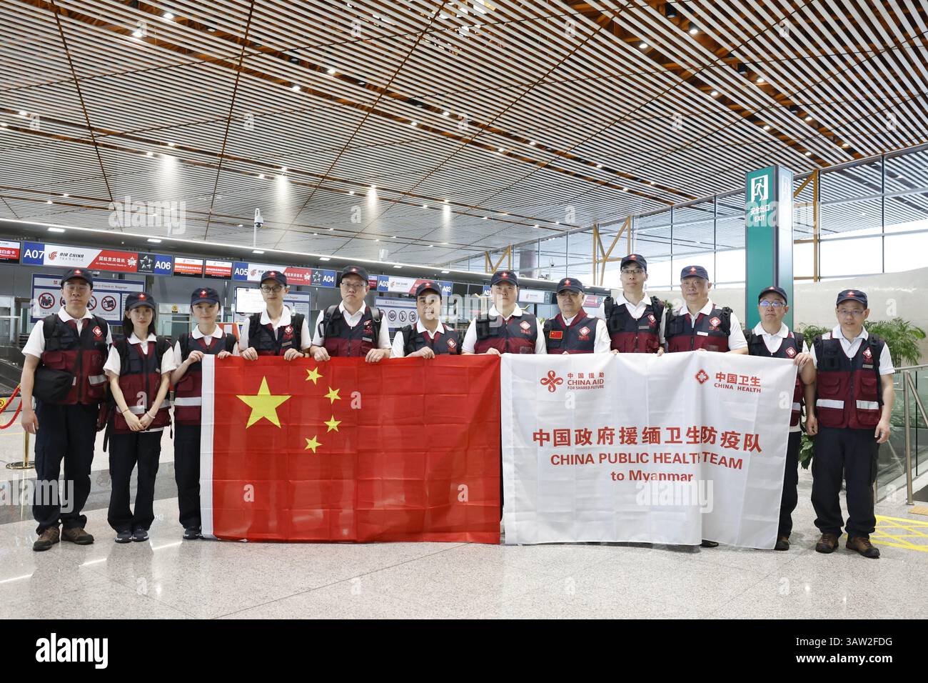 (250419) -- BEIJING, April 19, 2025 (Xinhua) -- Members of a public health team to Myanmar pose for a group photo before departing from the Beijing Capital International Airport in Beijing, capital of China, April 19, 2025. A 50-member Chinese public health team departed for Myanmar on Saturday to support post-earthquake public health efforts there.The 7.9-magnitude earthquake, which jolted Myanmar on March 28, has claimed 3,726 lives and left 5,105 people injured, with 129 others remaining unaccounted for as of April 18, according to Myanmar's State Administration Council Information Team on Stock Photo