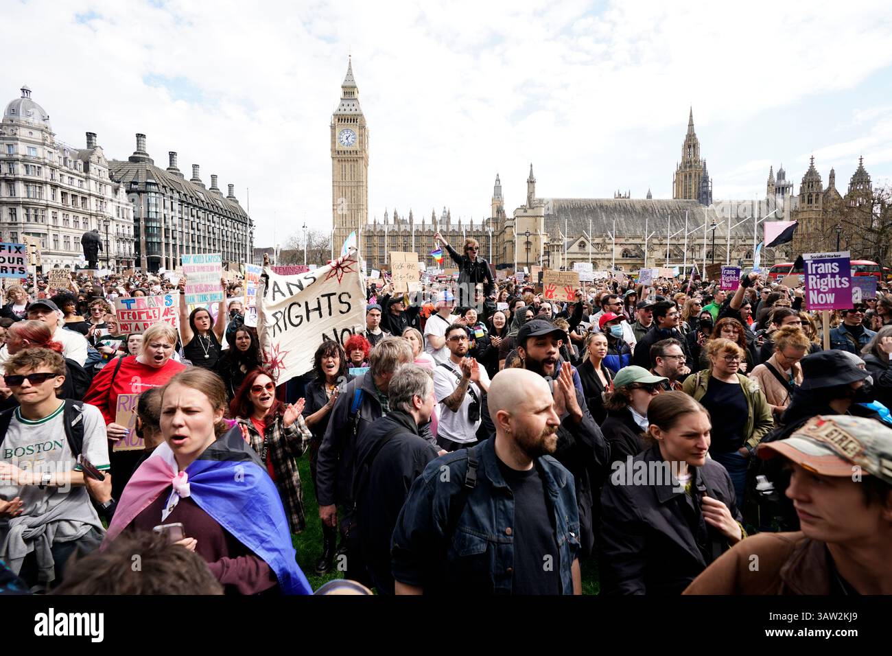 Campaigners take part in a rally organised by trans rights groups ...