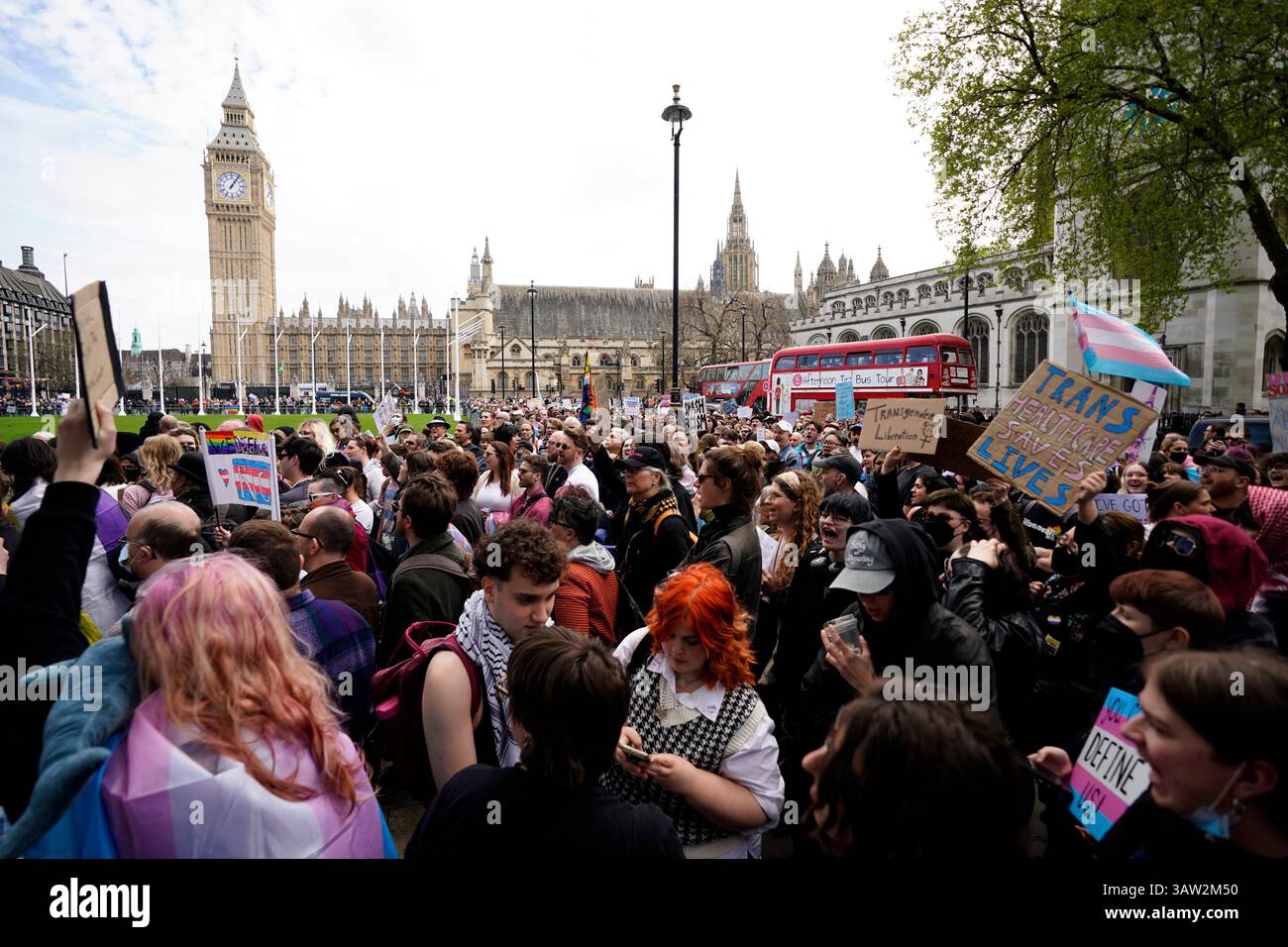 Campaigners take part in a rally organised by trans rights groups ...